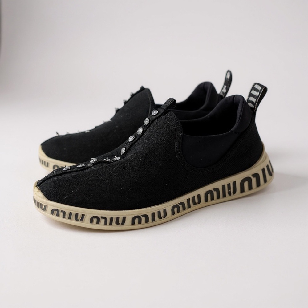 Miu Miu Black Canvas Slip-On Sneakers with Ivory Logo Sole